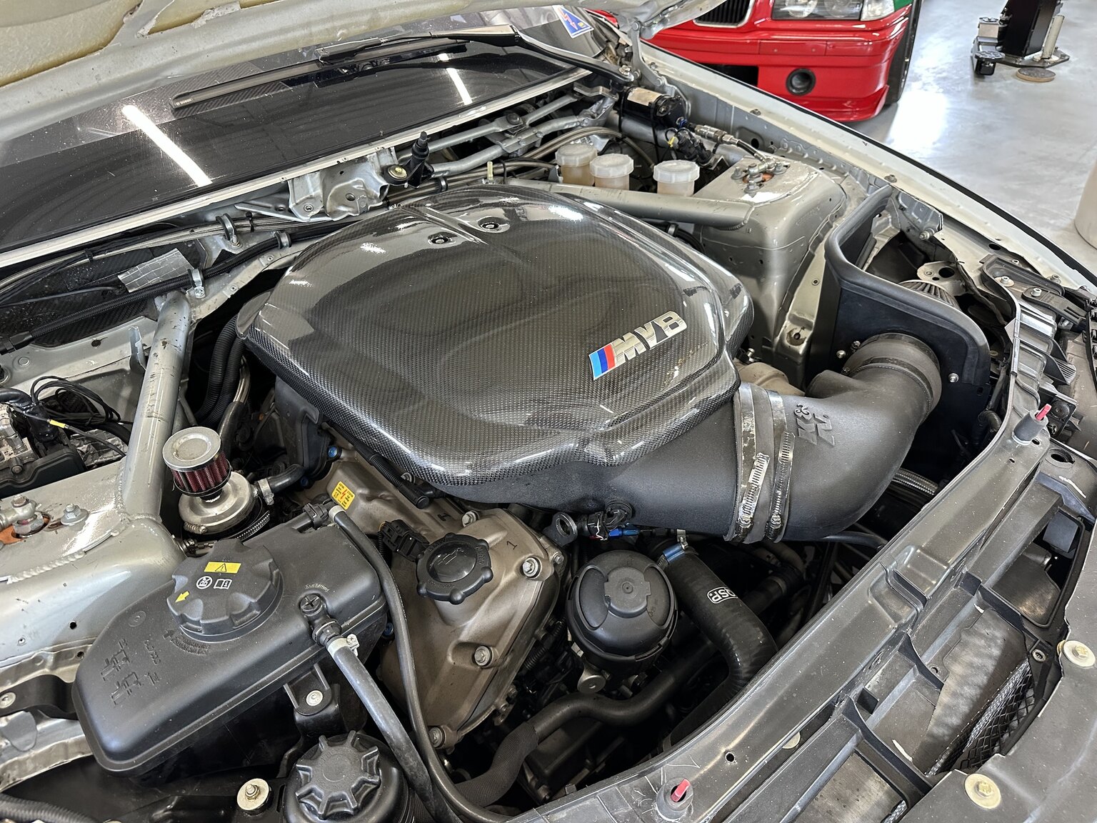 Image of 2012 BMW M140 Race Car mechanics