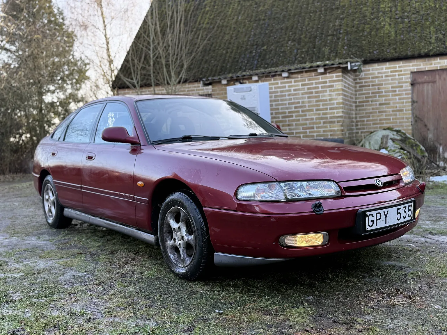 Exteriörbild på 1992 Mazda 626 Hatchback 2.5 V6 Automatic (5)