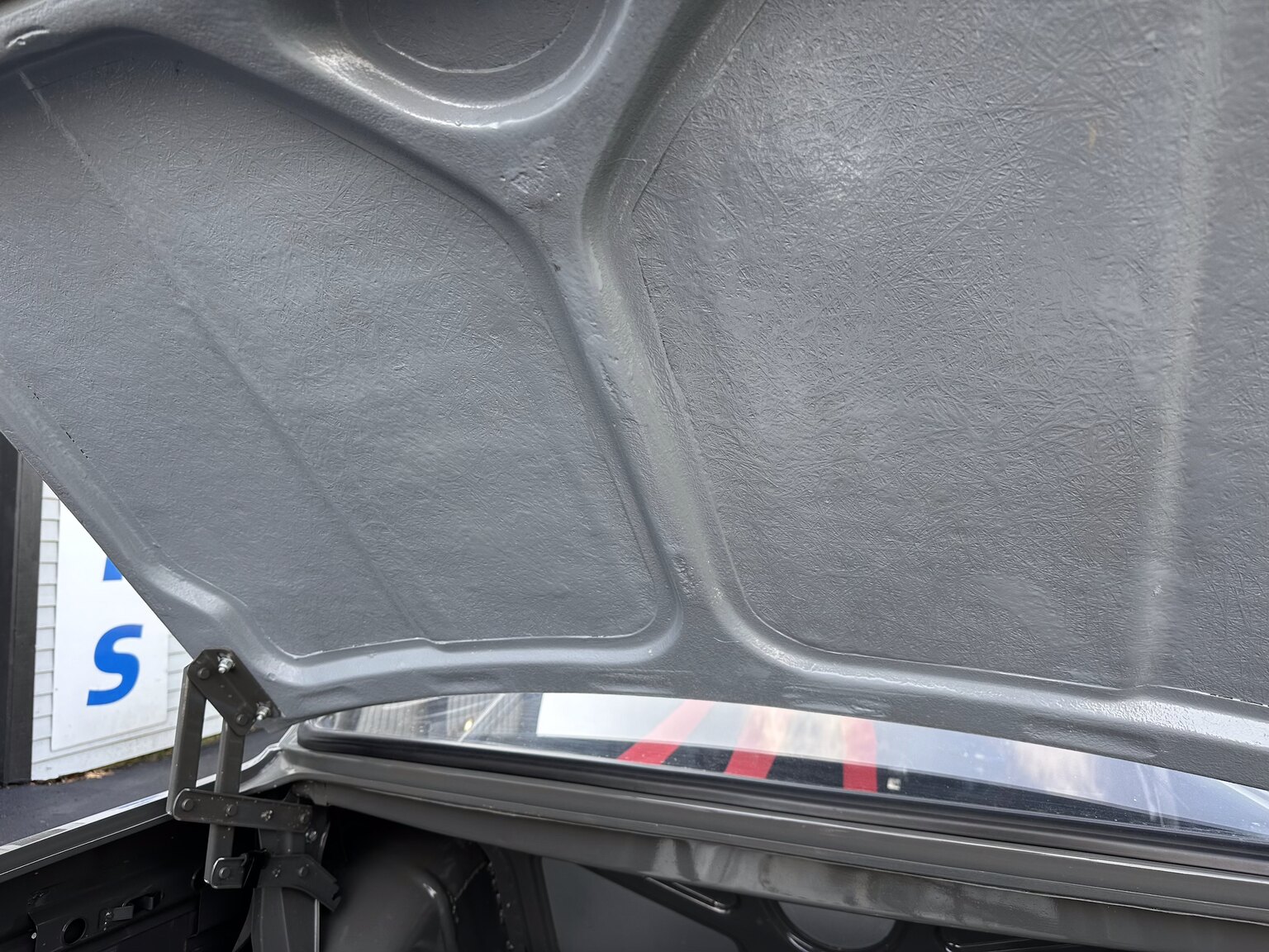 Image of 1969 Volvo 142 race car mechanics