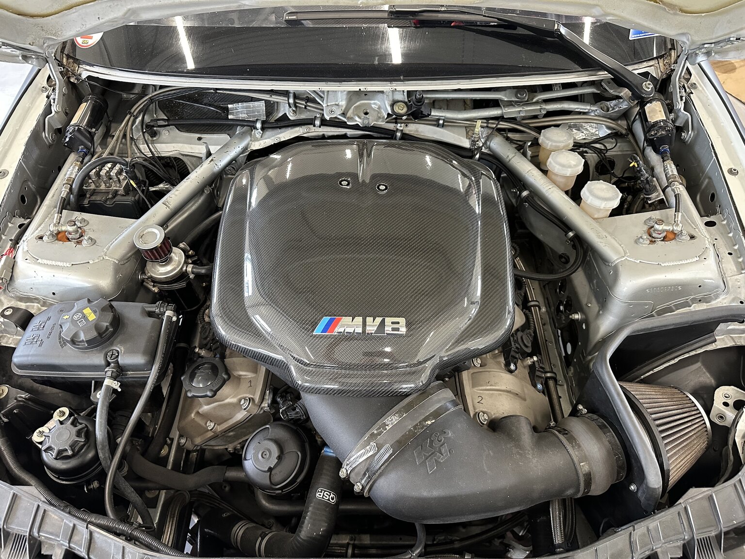 Image of 2012 BMW M140 Race Car mechanics