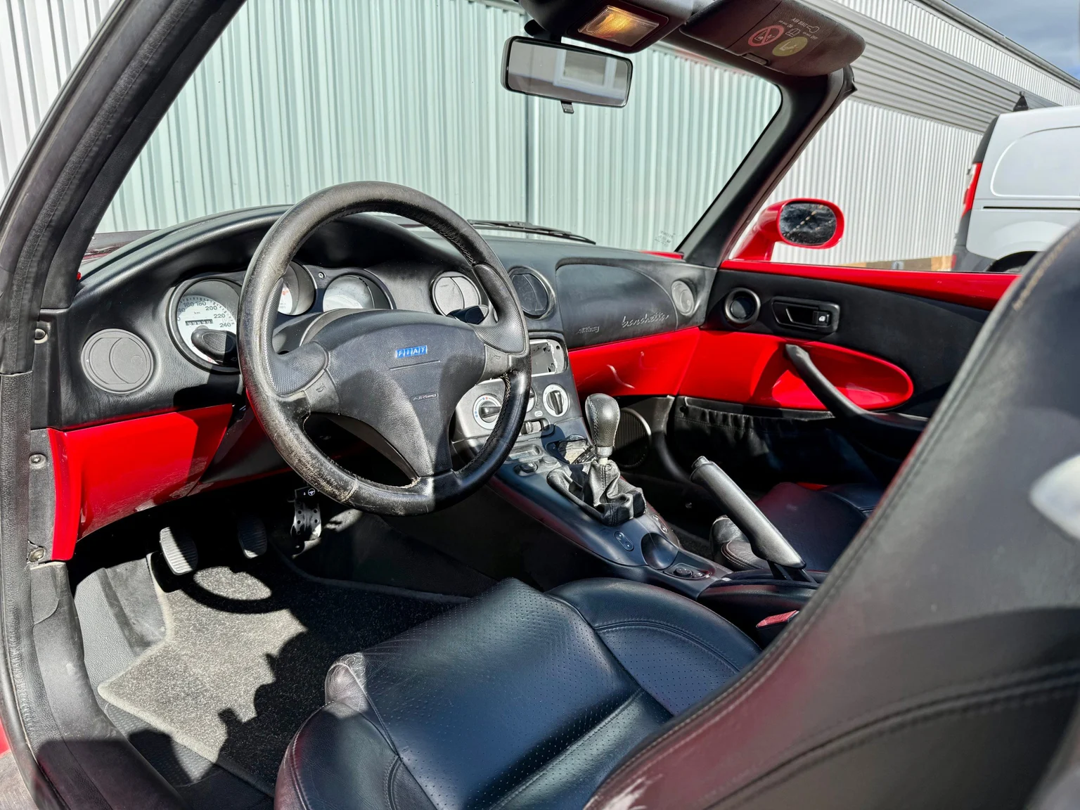 Interior image of 1999 Fiat Barchetta cab. (1)