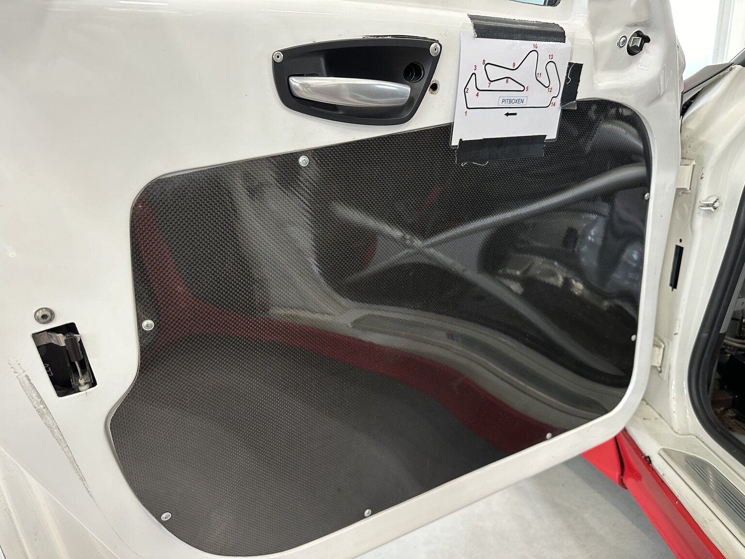Innenraumfoto von 2012 BMW M140 Race Car