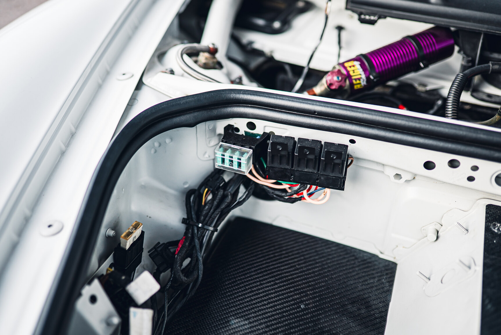 Image of 2011 Porsche 911 GT3 Rally Car mechanics
