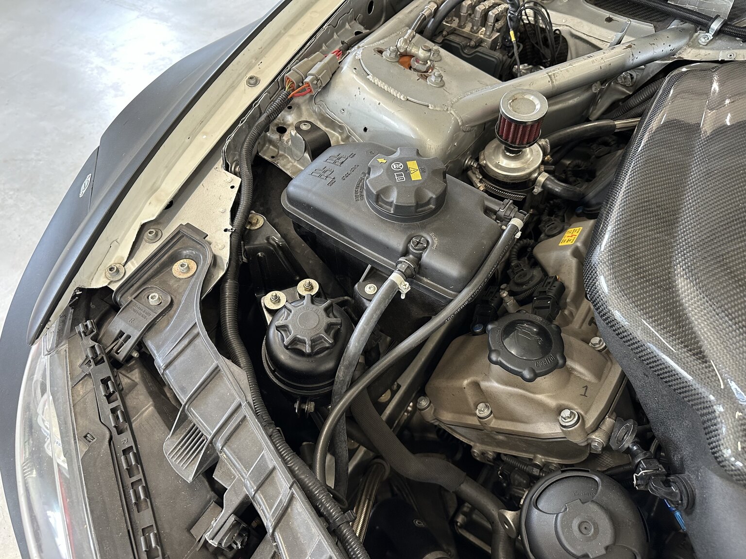 Image of 2012 BMW M140 Race Car mechanics