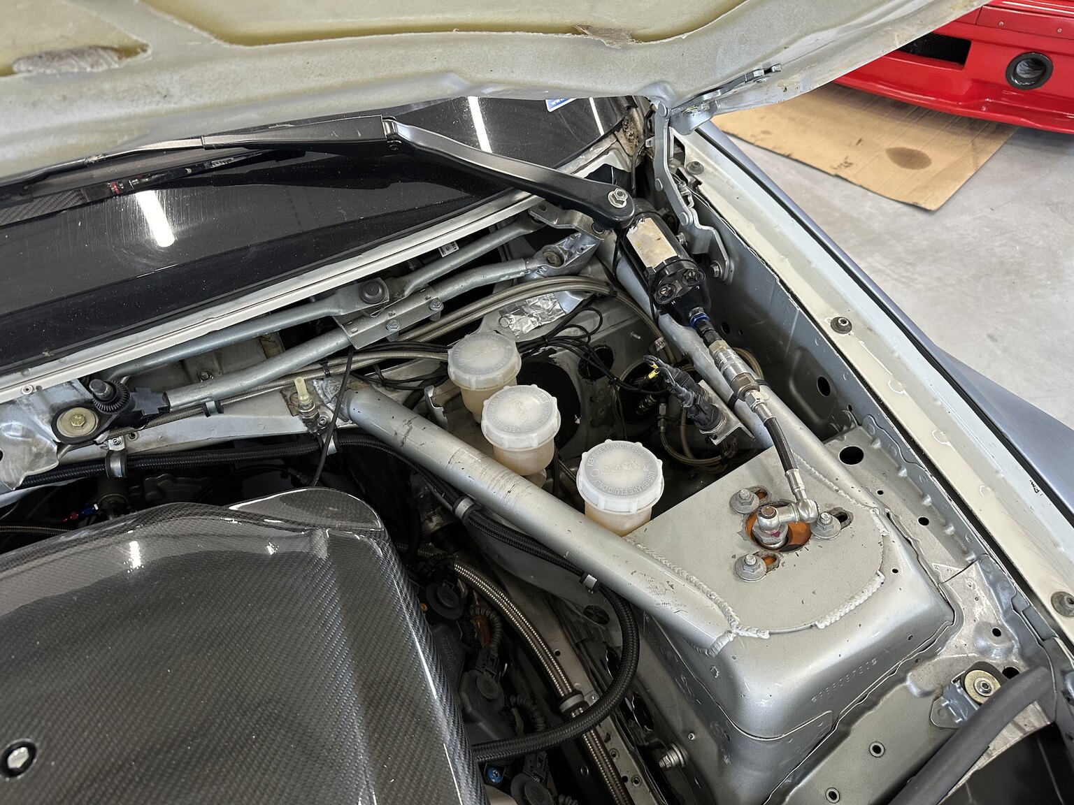 Image of 2012 BMW M140 Race Car mechanics