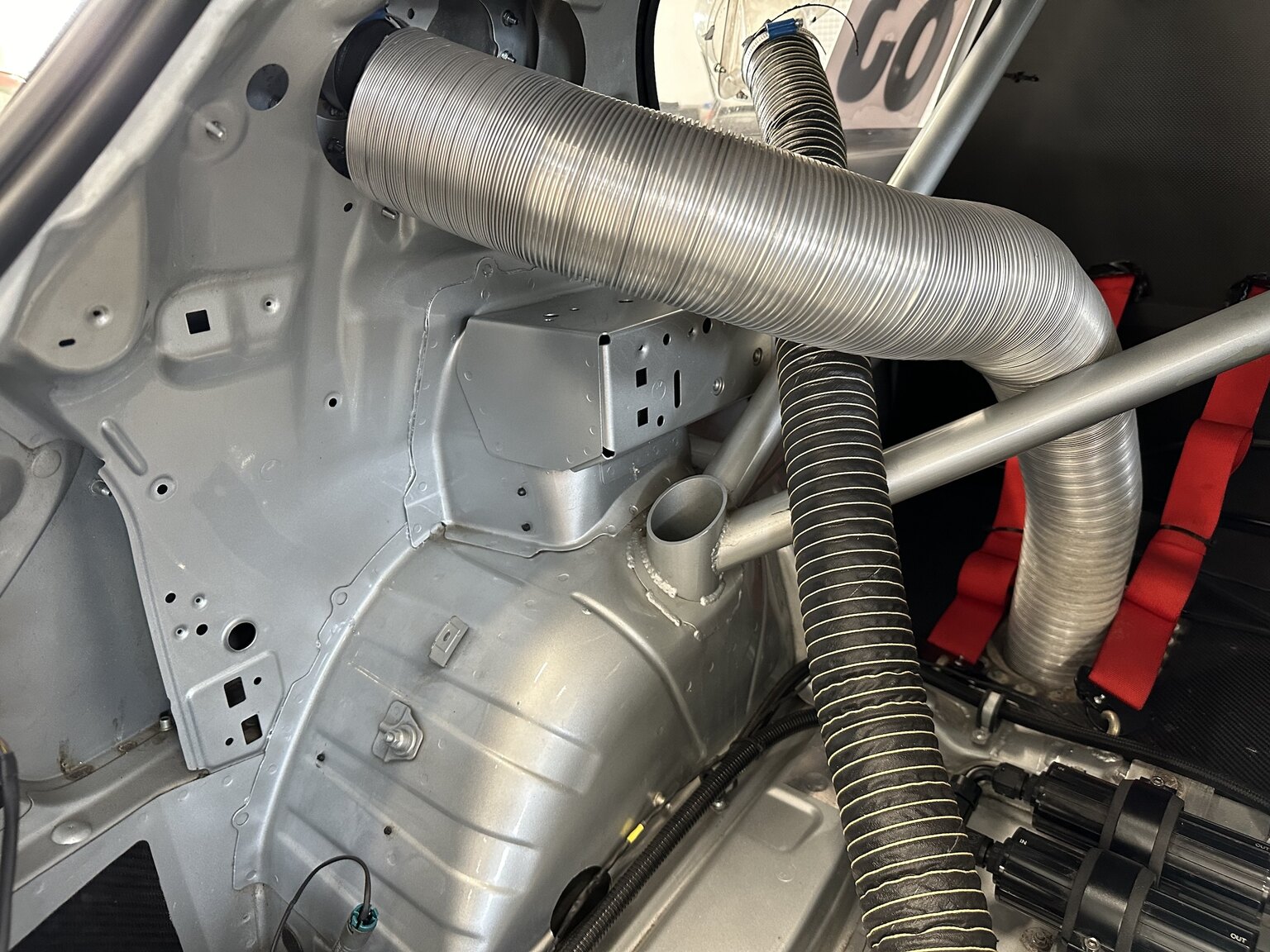 Image of 2012 BMW M140 Race Car mechanics