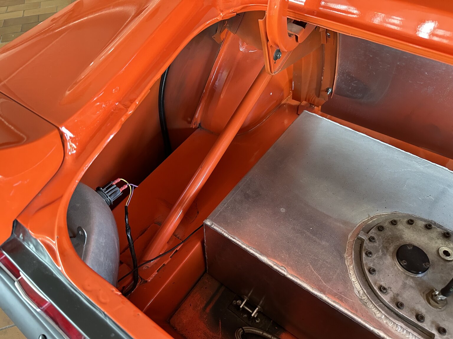 Image of 1969 Ford Mustang Fastback Boss Race Car mechanics